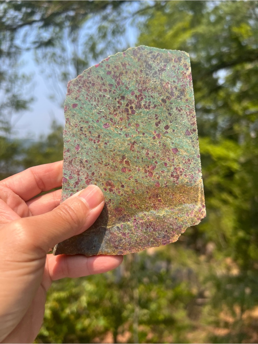Ruby (6) in fuchsite slab with stand | crystal